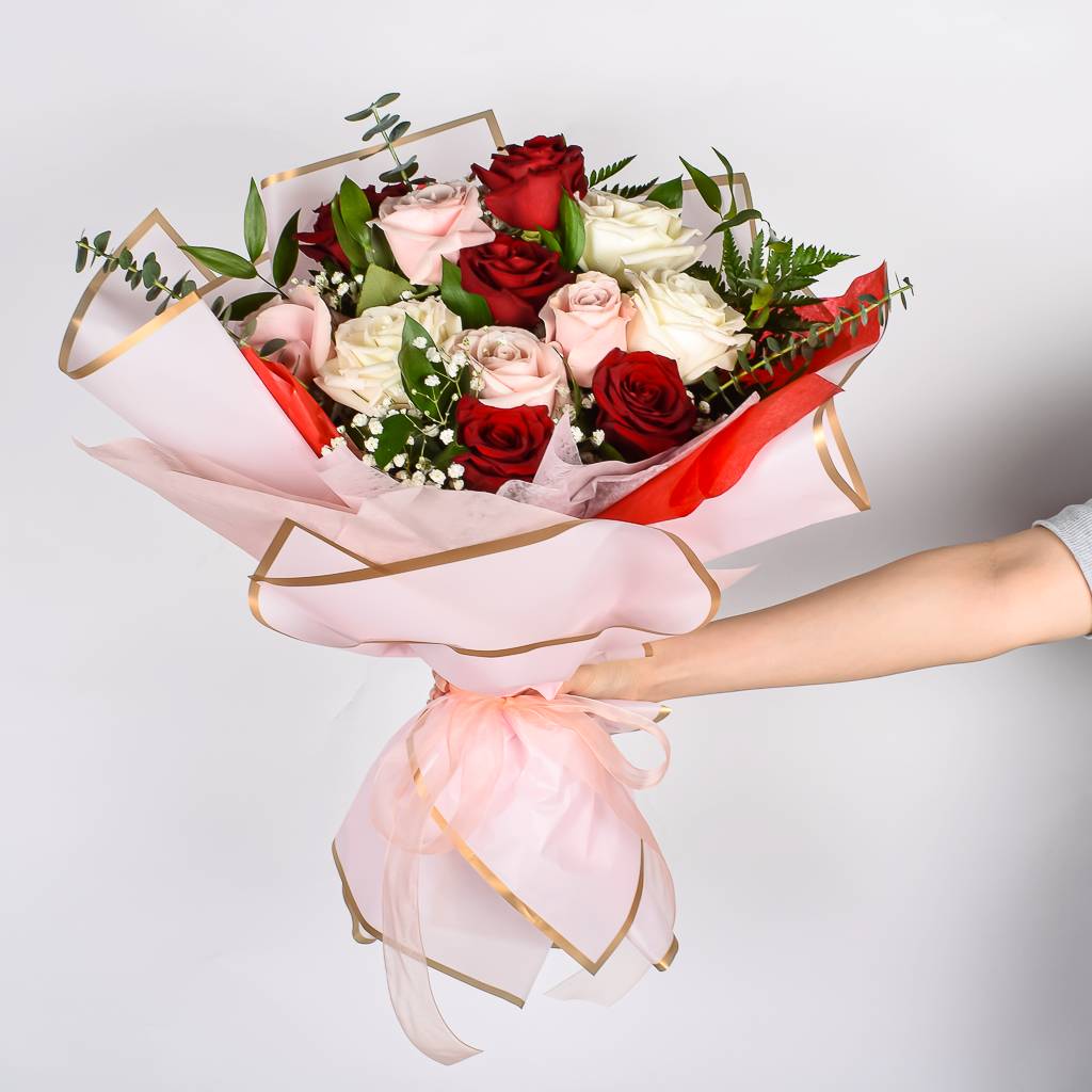 Hand Wrapped Bouquet With 12 Red, Pink And White Roses. Wrapped In A Pink Korean Style Paper
