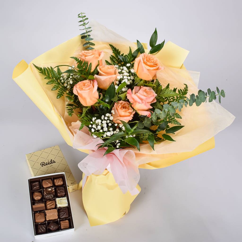 Assorted Chocolate Box With 6 Peach Roses Wrapped In Premium Paper 